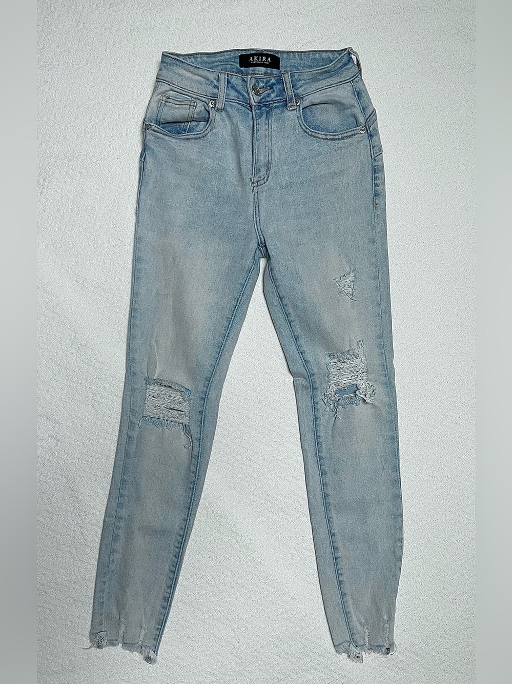 Akira Distressed Skinny Jeans